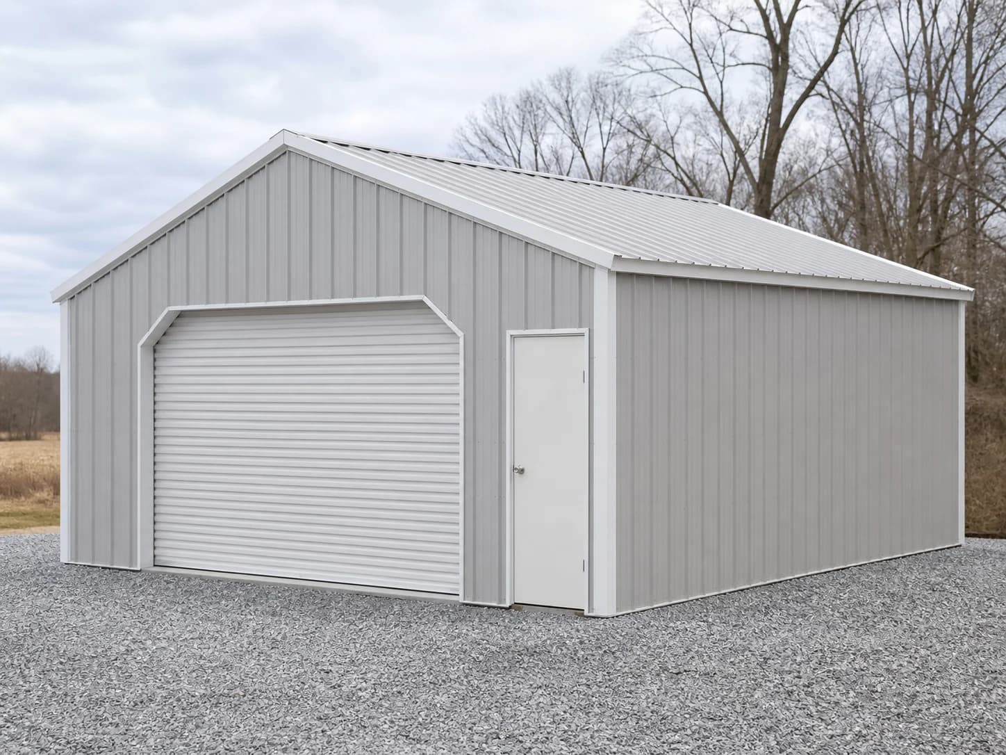 A 20 by 30 enclosed steel garage of the kind a manufacturer builds in one shop and sells through independent dealer lots.